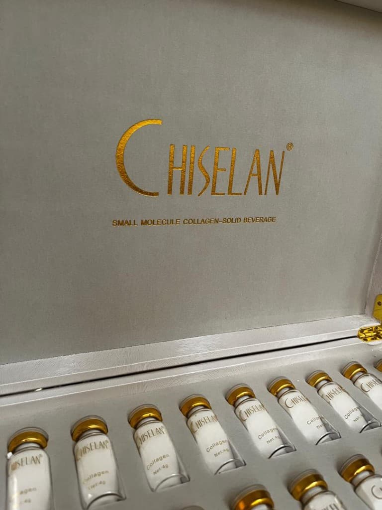 Open collagen case with gold lettering